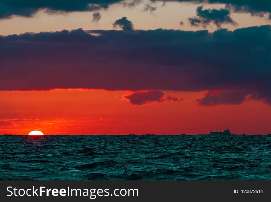 Hot and romantic sunset over the Baltic sea. Calm landscape. Hot and romantic sunset over the Baltic sea. Calm landscape