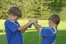 Boys Shooting String Royalty Free Stock Photo