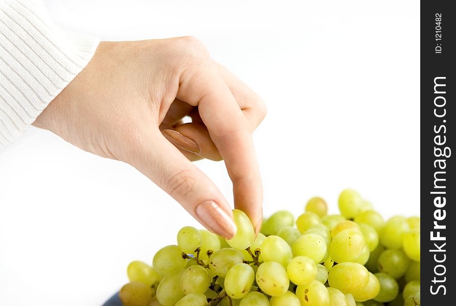 Grape with hand on white background