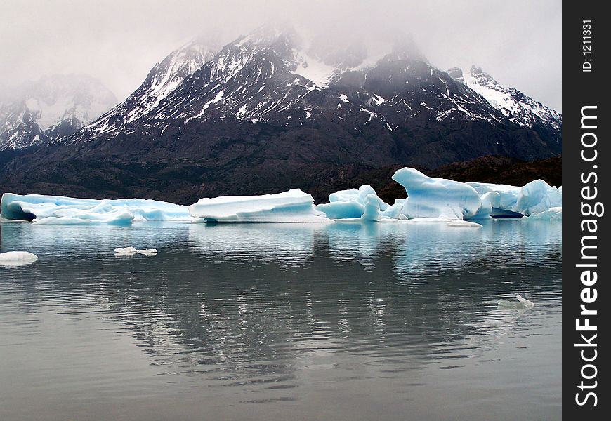 Lake, ice and mountain.