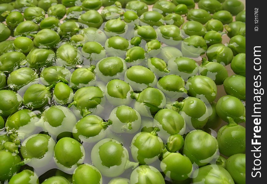 Green floating peas. Green floating peas