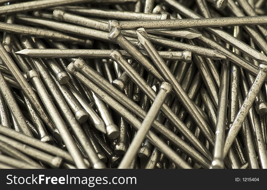 Macro shot of a lot of steel nails. Macro shot of a lot of steel nails