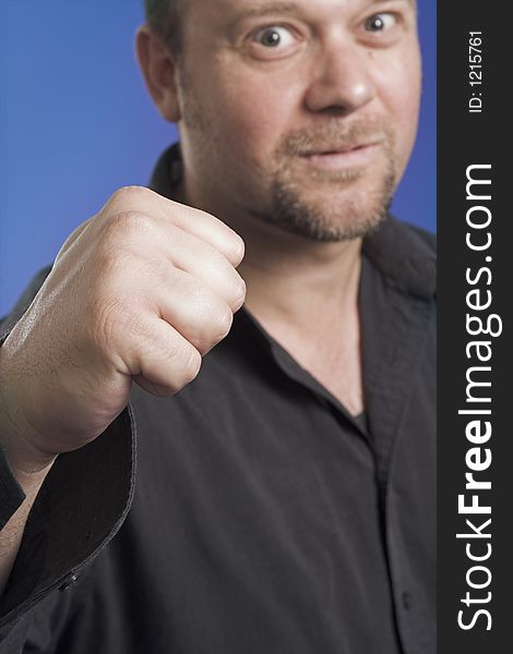 Man showing fist very strong