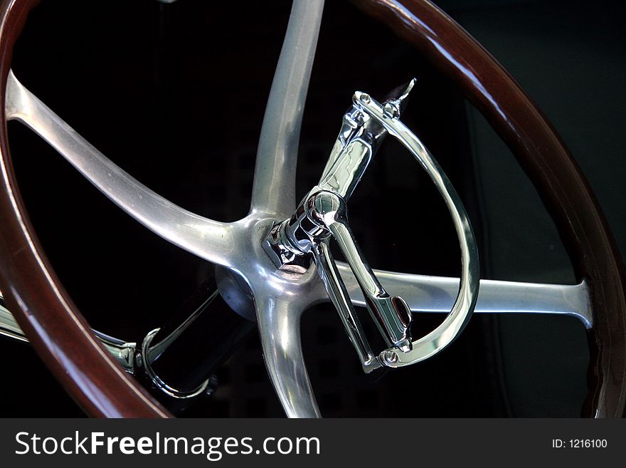 Antique boat steering wheel in Muskoka, Ontario. Antique boat steering wheel in Muskoka, Ontario