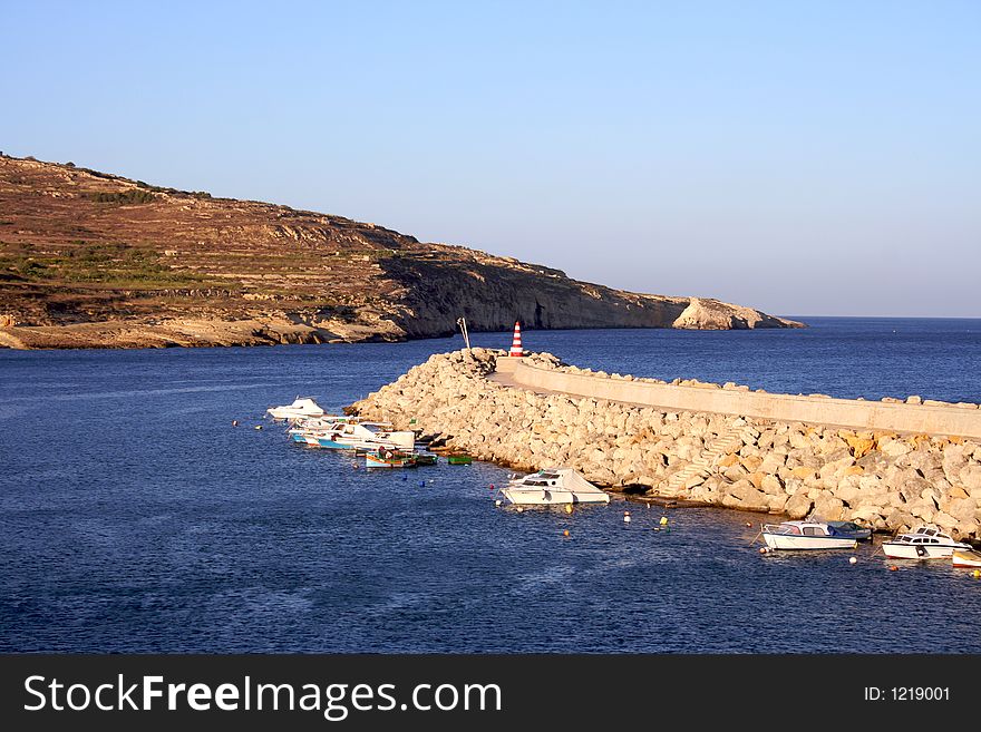 Water-break of Mgarr port on Gozo island, Malta. Water-break of Mgarr port on Gozo island, Malta