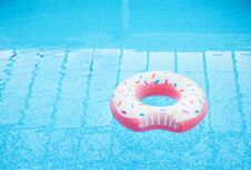 Inflatable Ring Floating On Water Stock Photo Inflatable Ring Floating On Water Stock Photo