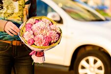 Hands Of Young Unidentified Woman Holding A Beautiful Bouquet Of Royalty Free Stock Images