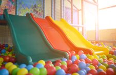 Children Playground With Plastic Slides And Colorful Balls In Po Royalty Free Stock Images