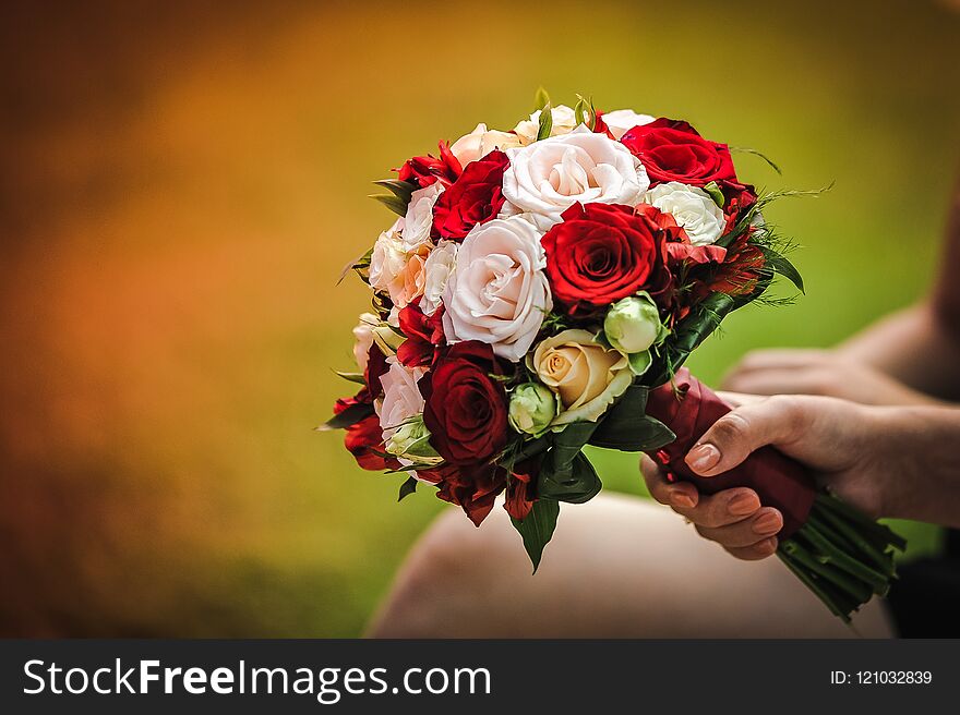 Stunning wedding bouquet with red and white roses. Stunning wedding bouquet with red and white roses.