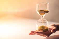 Hourglass On Male Hand, Time Passing Concept Stock Images Hourglass On Male Hand, Time Passing Concept Stock Images