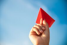 Soft Focus On Woman Hand Holding Red Paper Rocket With Blue Sky Stock Image Soft Focus On Woman Hand Holding Red Paper Rocket With Blue Sky Stock Image