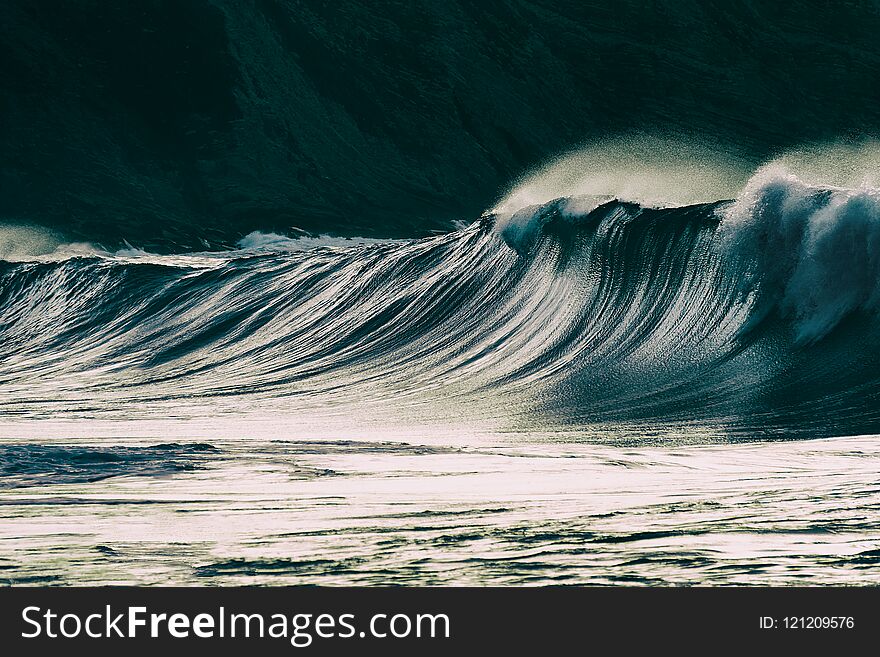 Lonely big wave breaking on sea