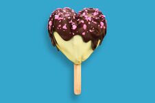 3d Rendering Of Vanilla Ice Cream Heart-shaped Topping By Chocolate With Pink Hearts, Isolated On Pale Blue Pastel Background Wit Stock Photos 3d Rendering Of Vanilla Ice Cream Heart-shaped Topping By Chocolate With Pink Hearts, Isolated On Pale Blue Pastel Background Wit Stock Photos