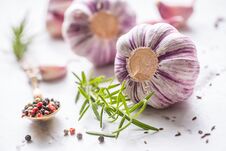 Garlic Cloves And Bulbs With Rosemary Salt And Pepper. Stock Photos