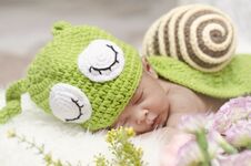 Portrait Of Cute Newborn Baby Sleeping On White Blanket Stock Image