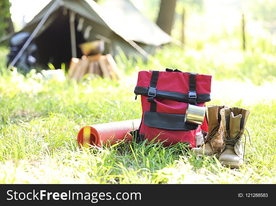 Traveling gear near tent outdoors. Summer camp