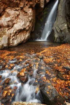 Beautiful River Waterfall In Autumn Forest, A Small Waterfall Part Of Fotinski Waterfalls, Rhodope Mountains, Bulgaria Stock Photo