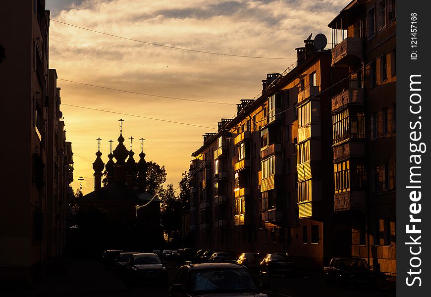 Silhouette of a church against the background of a rising sun. Silhouette of a church against the background of a rising sun