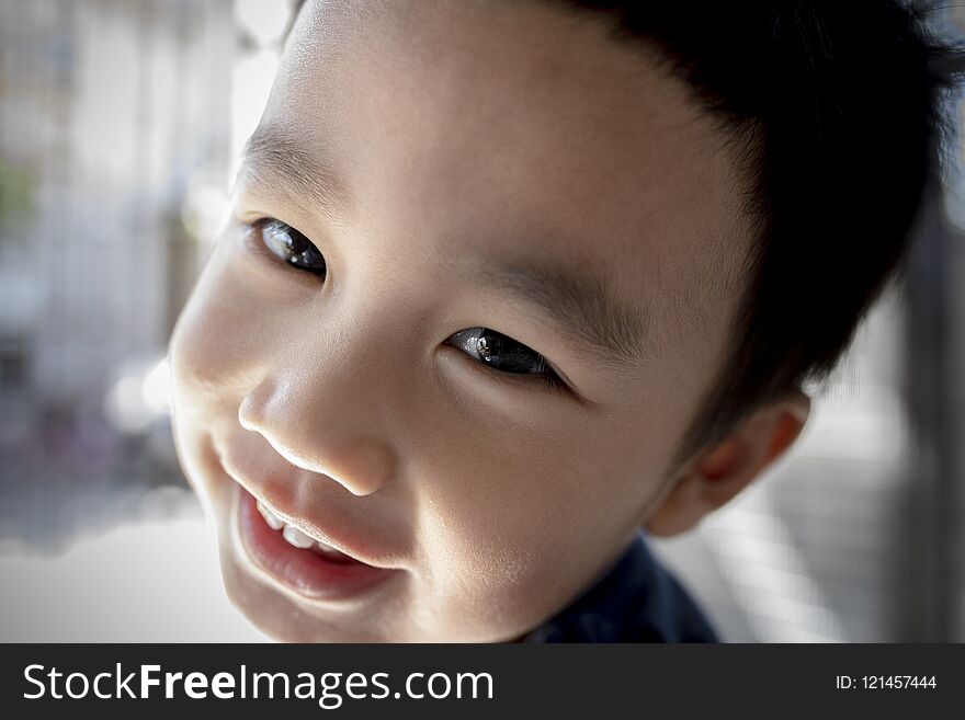 Close up face with eye contact of asian children