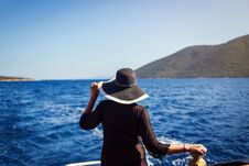 Beautiful Girl In Hat Relaxing On The Boat And Looking At The Is Stock Image