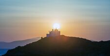 Mediterranean Sea. Beautiful Sunset And A Lighthouse At Kea Island, Greece. Stock Image Mediterranean Sea. Beautiful Sunset And A Lighthouse At Kea Island, Greece. Stock Image