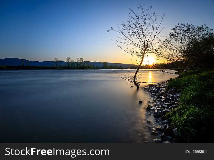 Long exposure sunrise over river