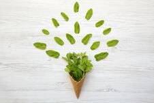 Waffle Sweet Cone With Mint Leaves Over White Wooden Surface, Top View. Flat Lay, Overhead. Stock Images