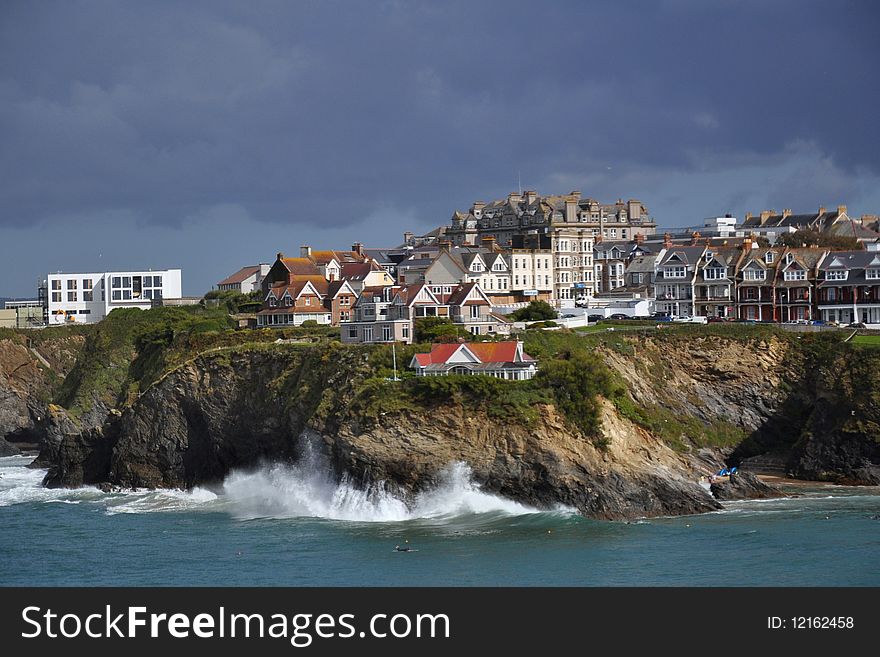 Dramatic Stormy Clouds In Sky Over Bay With Cliffs