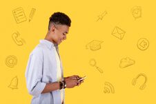 Smiling Blogger Typing Messages To His Followers And Looking Glad Royalty Free Stock Photo Smiling Blogger Typing Messages To His Followers And Looking Glad Royalty Free Stock Photo