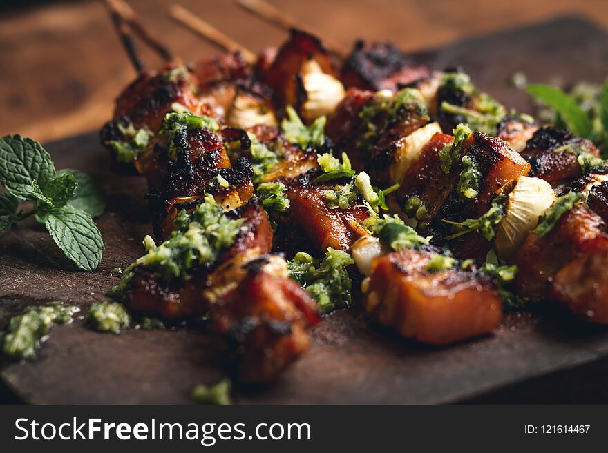 Roasted pork onion skewer barbecue on Chopping board