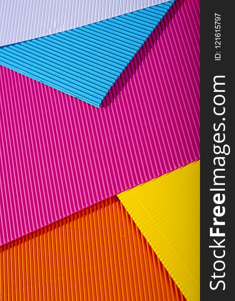 Abstract Background Of Sheets Of Colored Paper