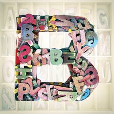 Small Wooden Letters To Make Up The Letter B Stock Photo