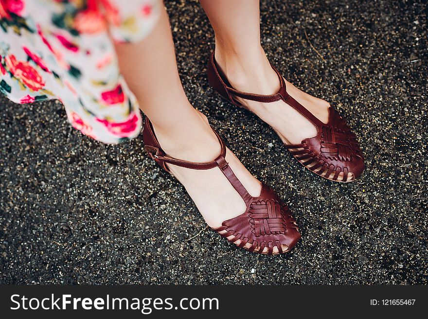 Girl wearing fashion t-bar sandals
