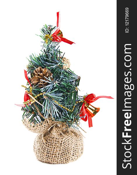 Decorative toy firtree for a Christmas or New Year celebration. Decorative toy firtree for a Christmas or New Year celebration