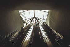 Silhouettes Of People Coming From The Escalator Royalty Free Stock Image Silhouettes Of People Coming From The Escalator Royalty Free Stock Image