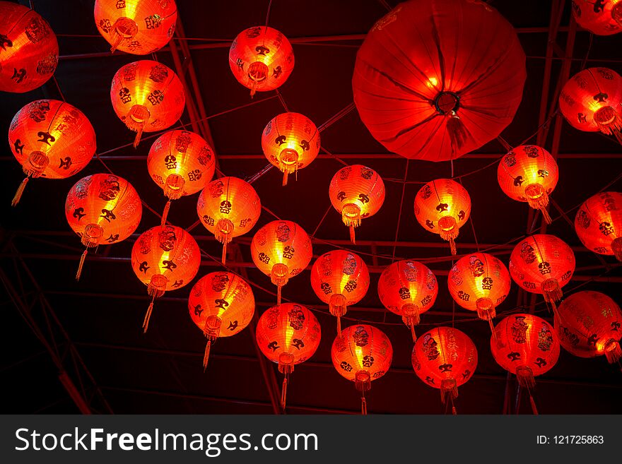 Red Chinese lanterns in the interior of the temple