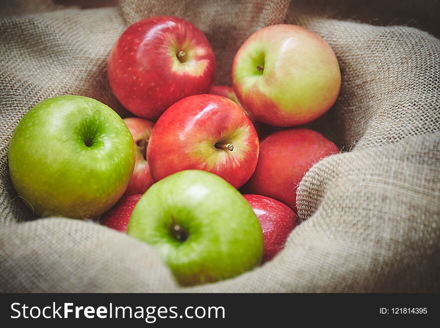 Selective Forcus, Close-up Of Red Apples In Basket, Sackcloth Texture Background