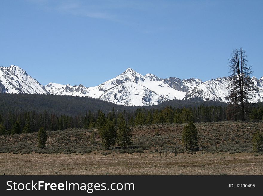 The snowy and rugged Sawtooth mountains in Idaho, USA. The snowy and rugged Sawtooth mountains in Idaho, USA.