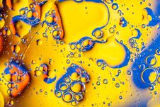 Macro Shot Of Oil Bubbles With Water On Colorful Background. Space And Universe Planets Styled Abstract Image Stock Images