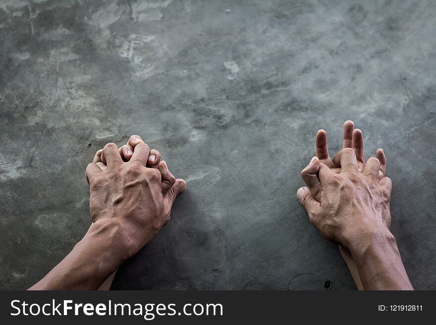 Man`s hand holding a woman hand, sexual abuse and concept