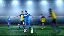 Young Soccer Players In Action On The 3D Soccer Stadium. Stock Photo