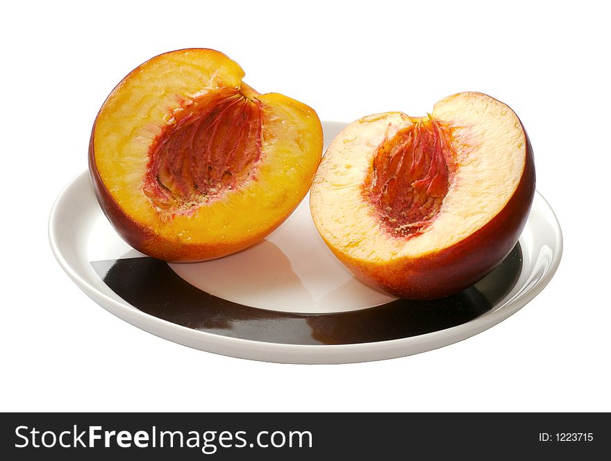 Sliced peach on the plate
