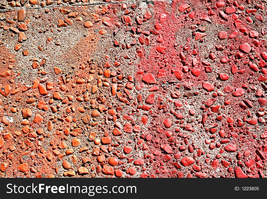 Rough red and orange concrete