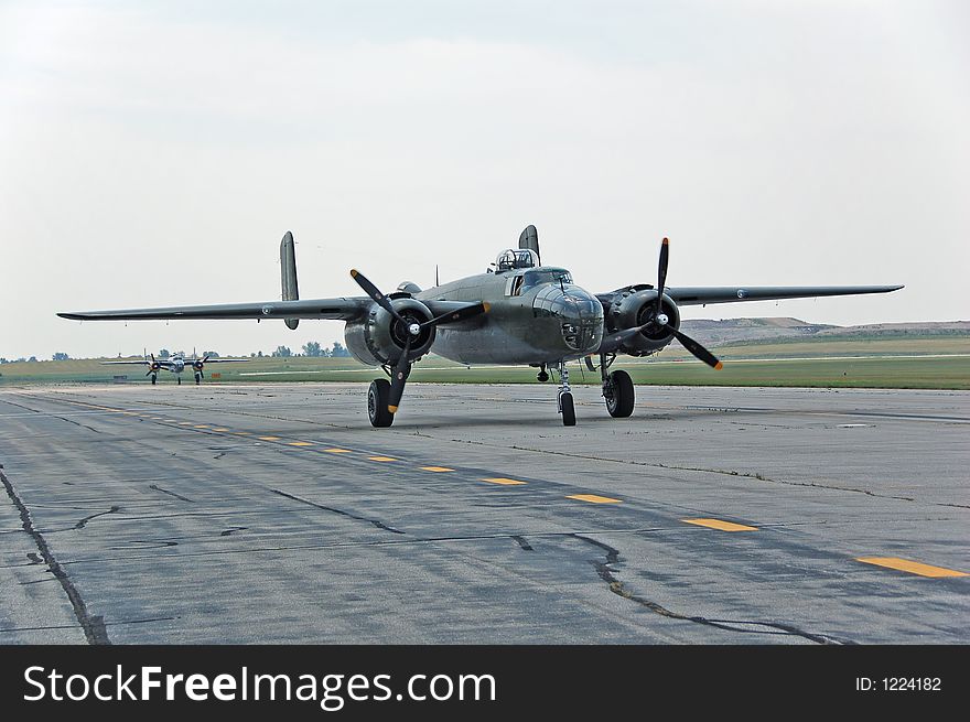 Rare shot of two B-25 vintage bombers on runway. Rare shot of two B-25 vintage bombers on runway