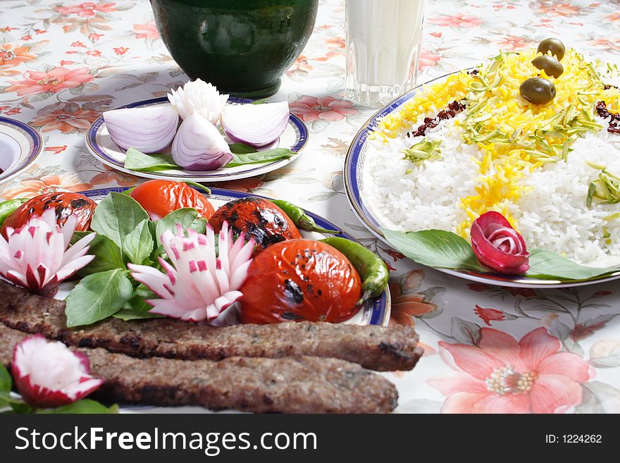 Best iran food , rice and roast meat with tomato, yogurt diluted with water