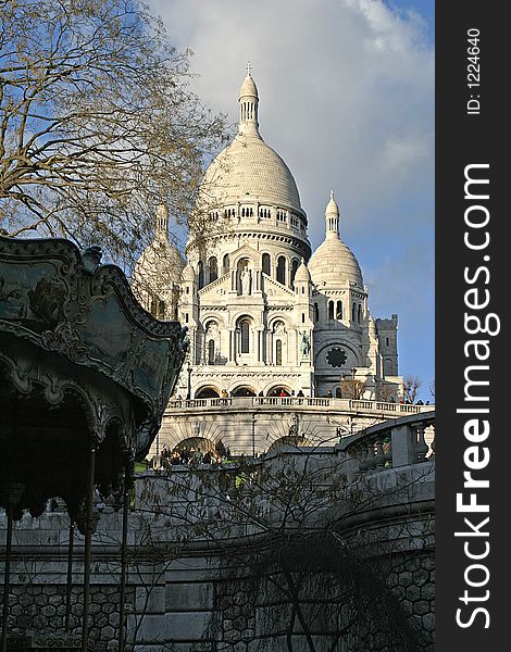 Contrast to a merry-go-round and the Sacré Coeur in Paris. Contrast to a merry-go-round and the Sacré Coeur in Paris.