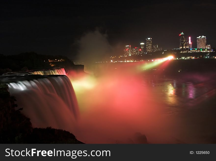 Niagara Falls by Night with Canadian part of the city in a background