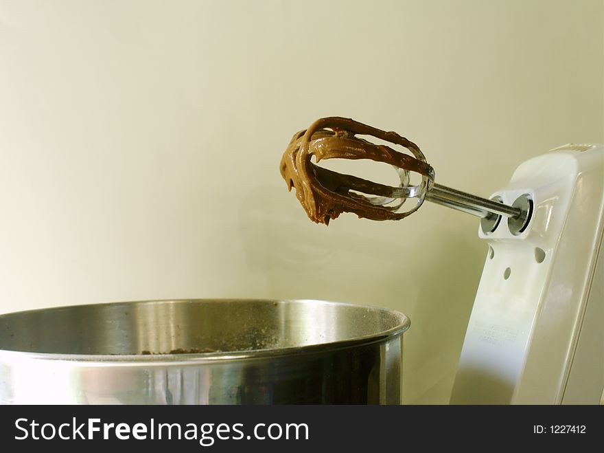 Batter and an electric mixer. Batter and an electric mixer