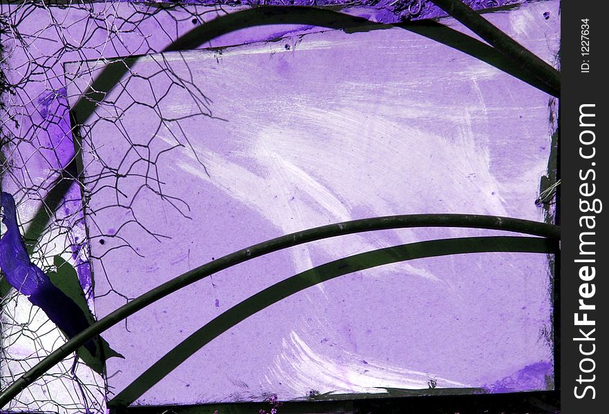 Board, chicken wire and hose on painted purple board. Board, chicken wire and hose on painted purple board