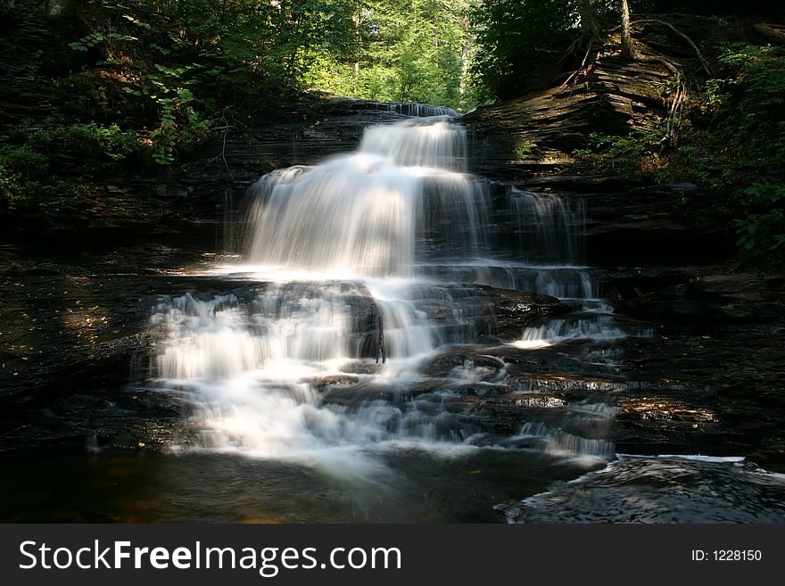 Waterfall at Rickett's Glenn State Park in Pennsylvania. Waterfall at Rickett's Glenn State Park in Pennsylvania